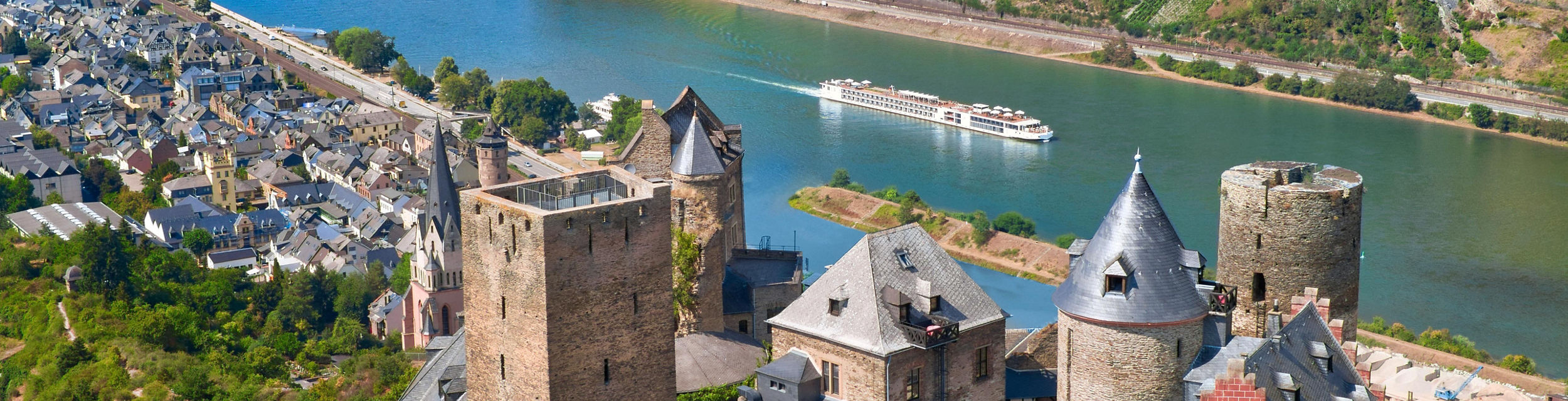 Historic castle overlooking scenic river valley