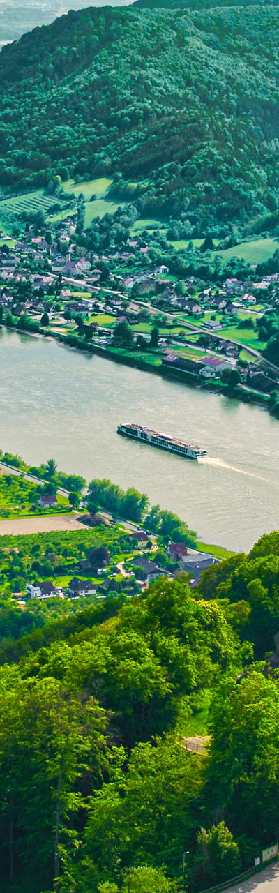 Scenic River Valley with Historic Castle