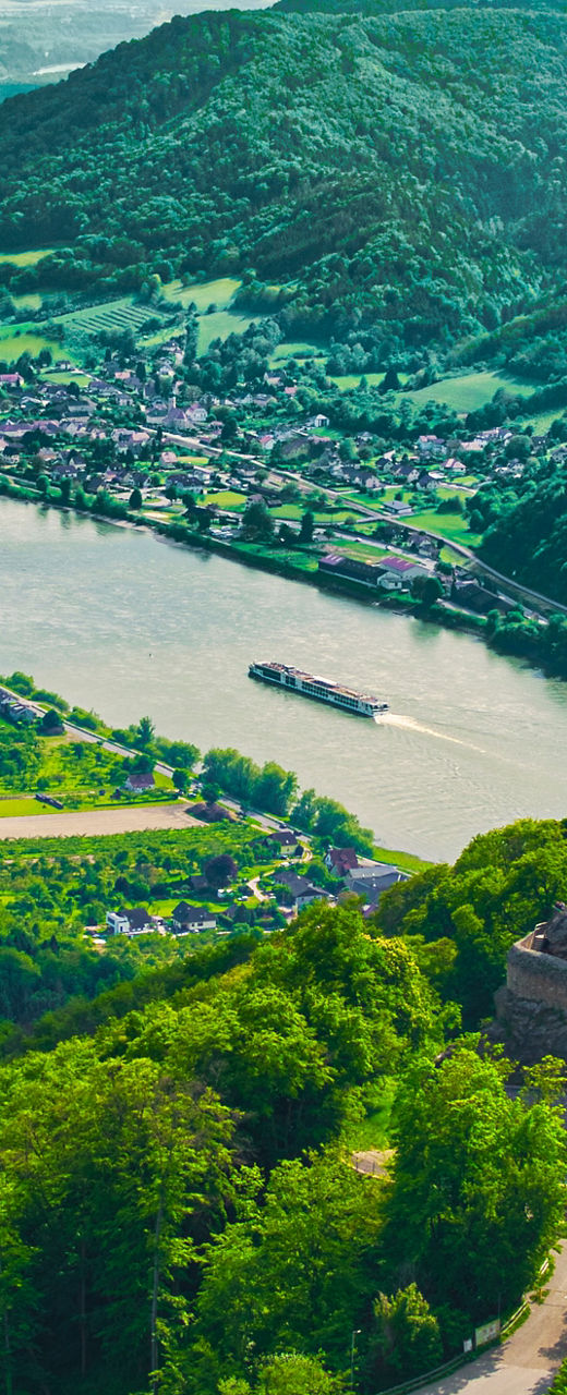Scenic River Valley with Historic Castle