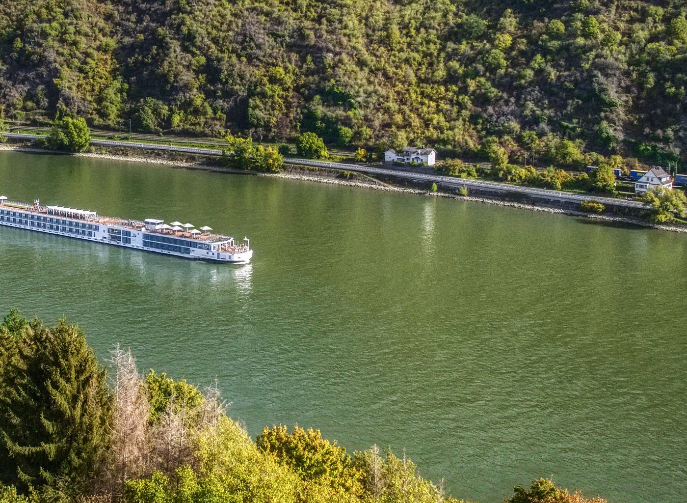 Scenic river cruise through lush valley