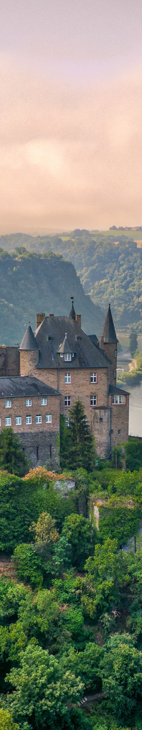 Scenic castle overlooking river valley