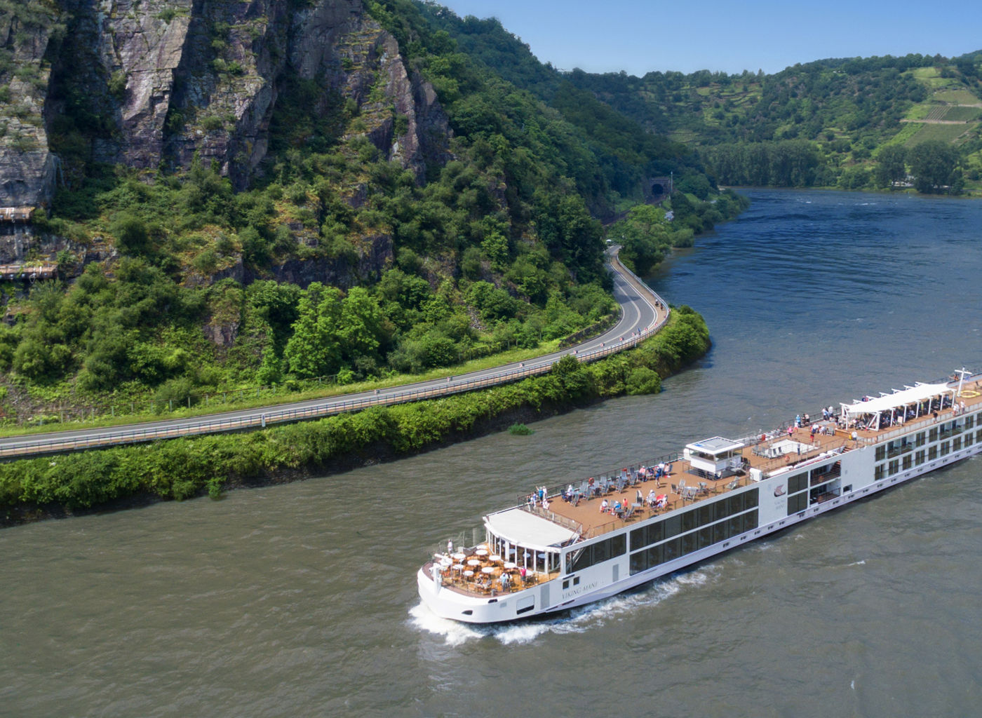 Scenic river cruise through lush valley