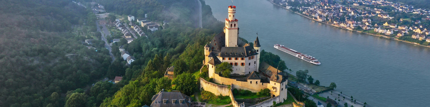 Aerial view of historic castle by river