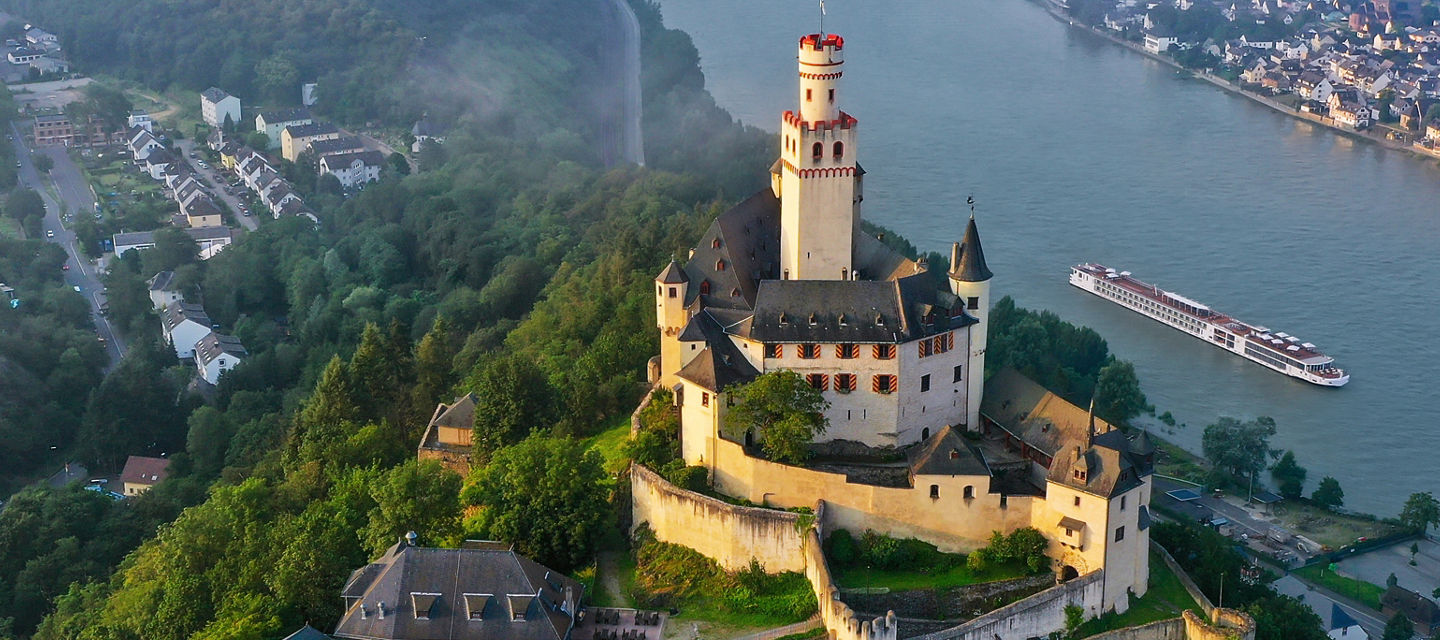Aerial view of historic castle by river