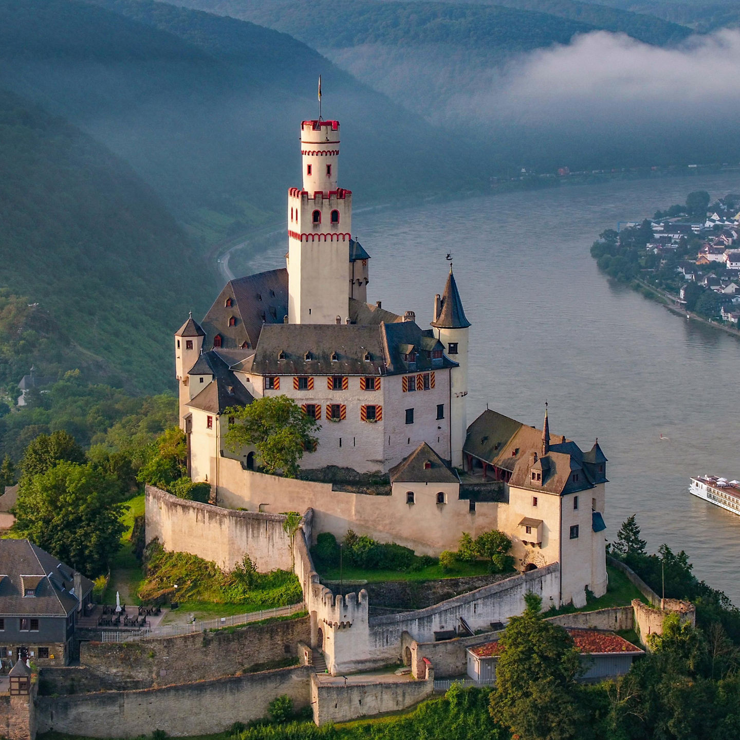 Historic castle overlooking river valley
