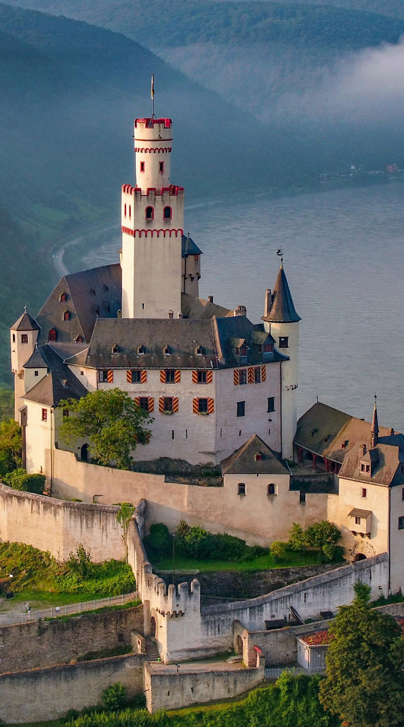 Historic castle overlooking river valley