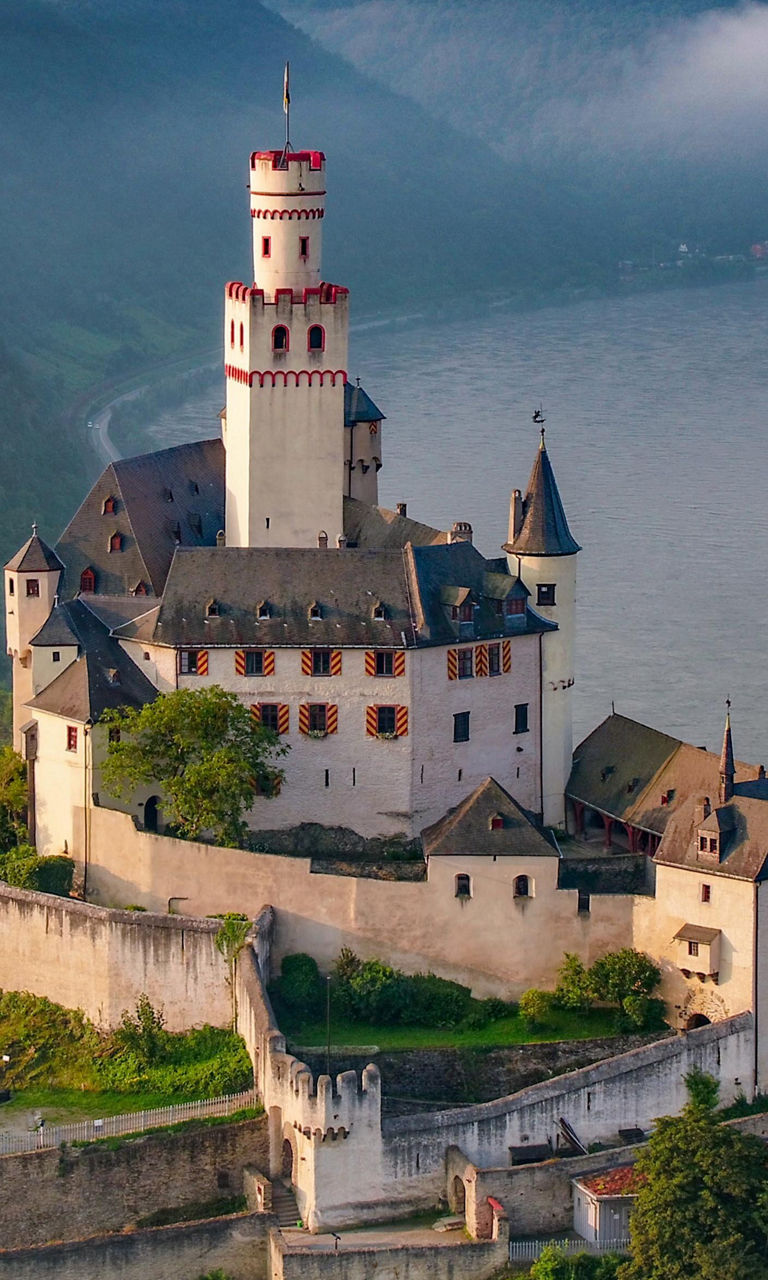Historic castle overlooking river valley