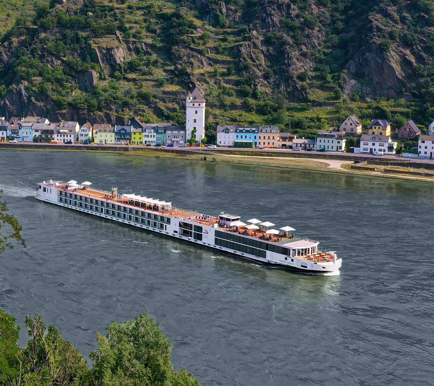 Scenic river cruise through lush valley