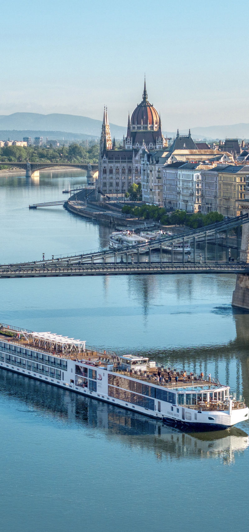 River cruise ship in Budapest cityscape
