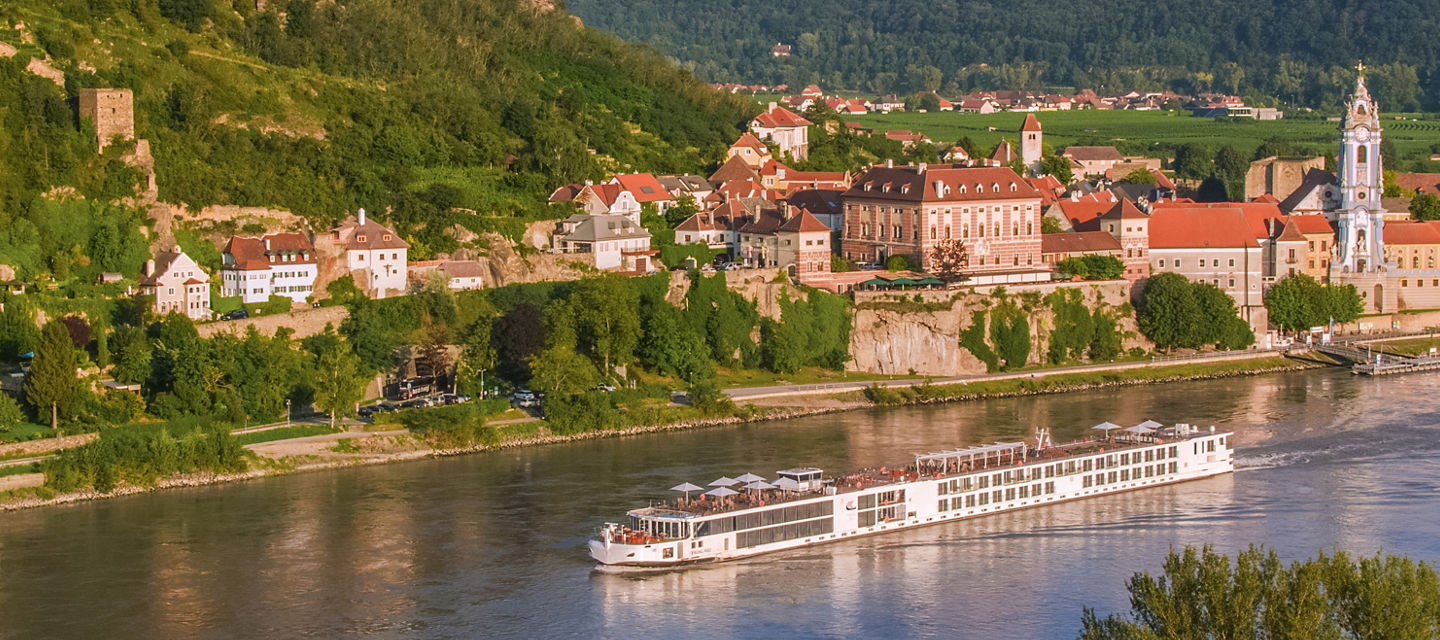 Scenic river cruise through European village