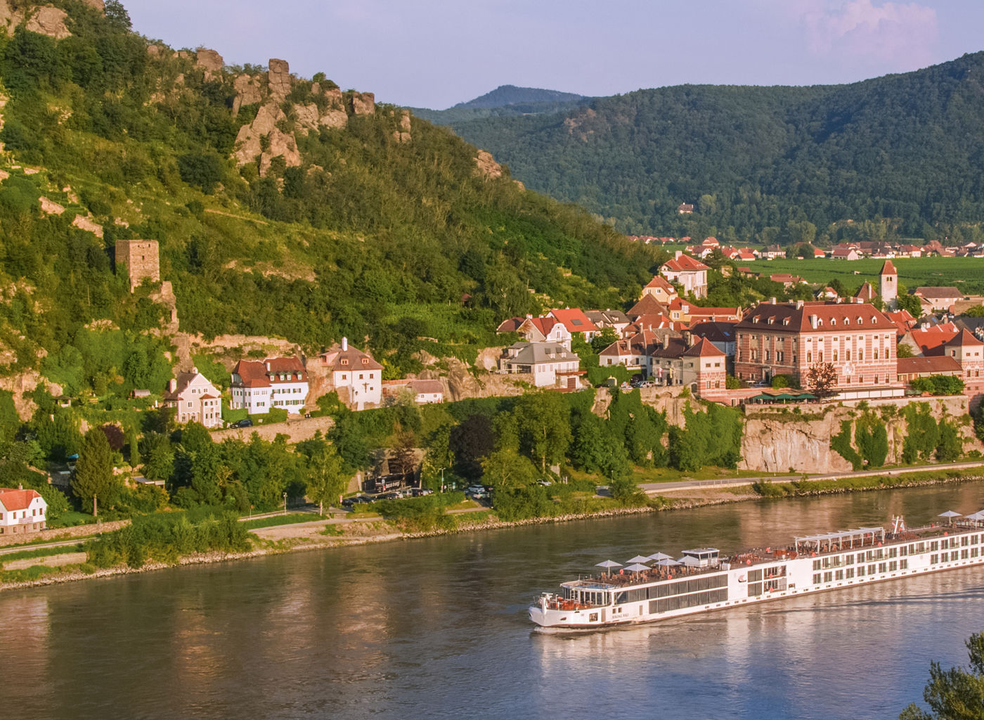 Scenic river cruise through European village