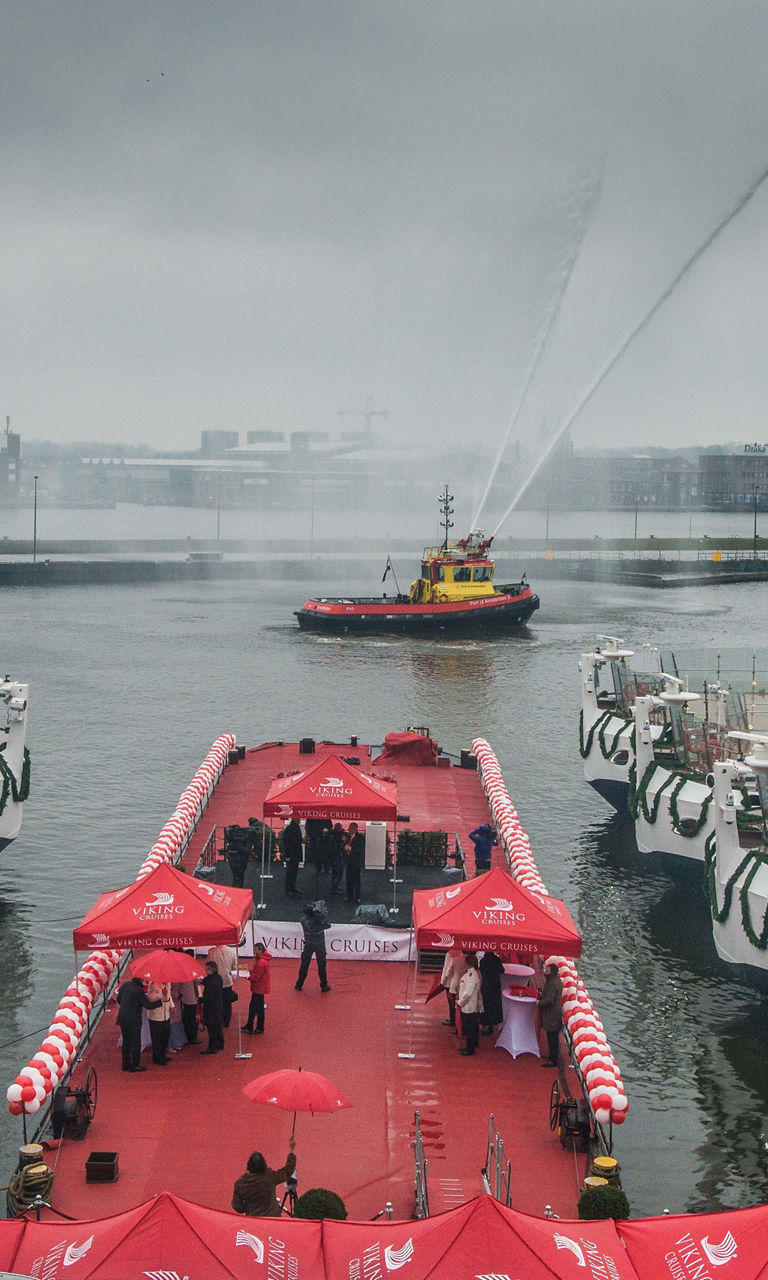 Harbor Celebration with Decorated Boats and Tugboat Display