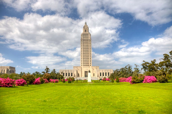 Louisiana State Capitol with vibrant gardens