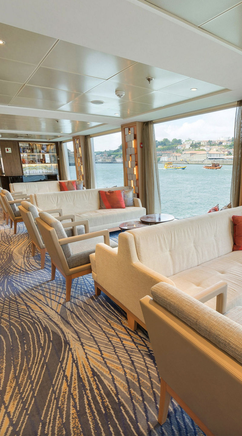 Modern riverside lounge with scenic views