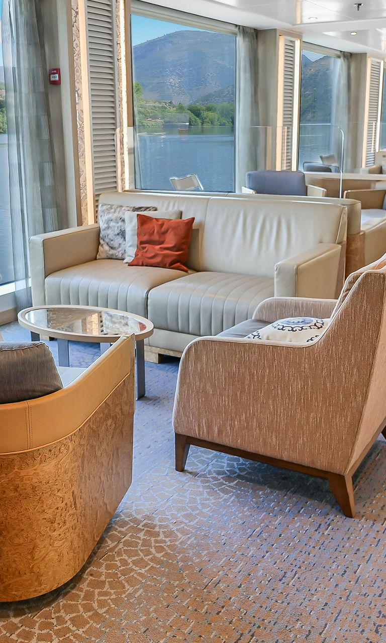 Elegant river cruise lounge with scenic views