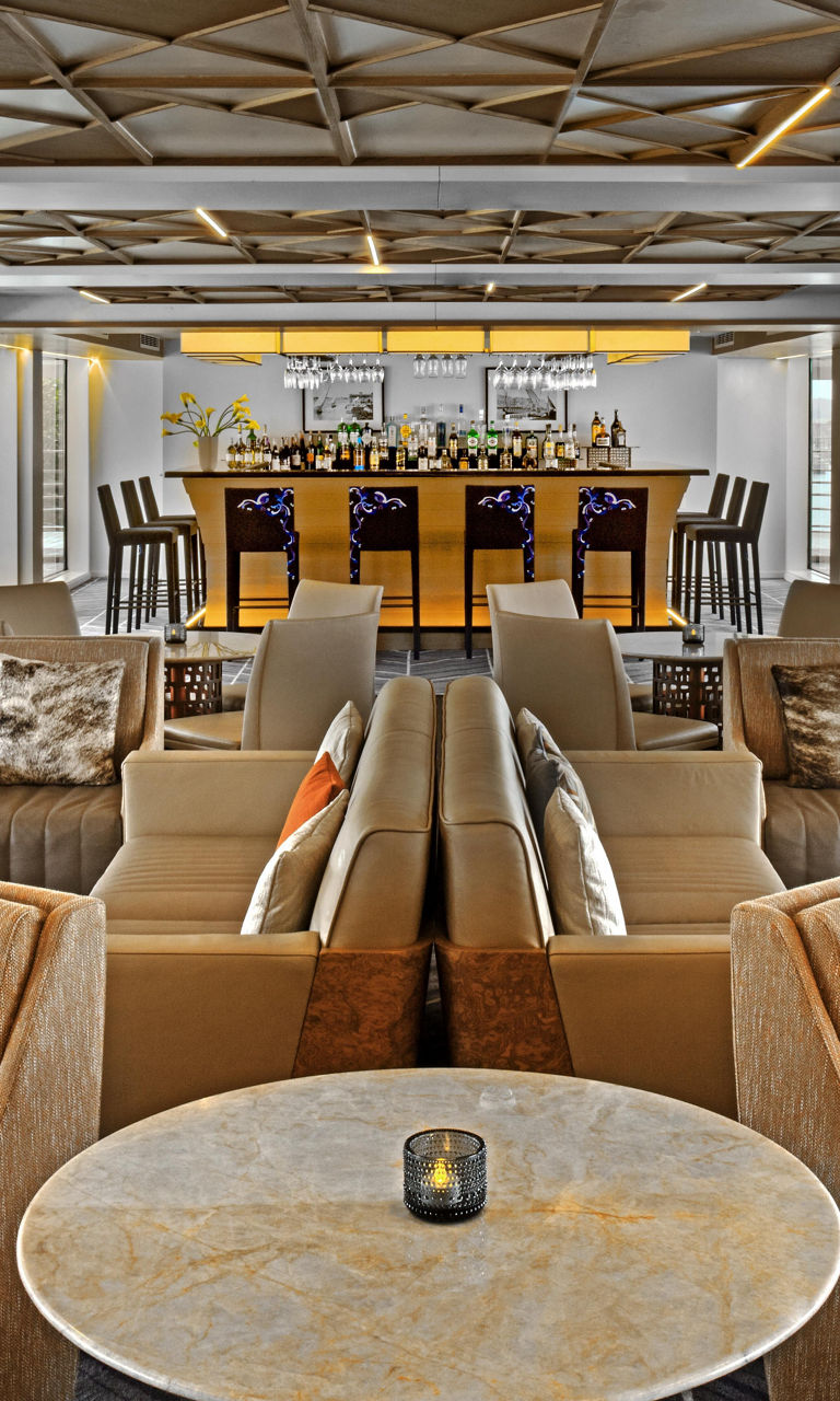 Elegant lounge with modern bar setting