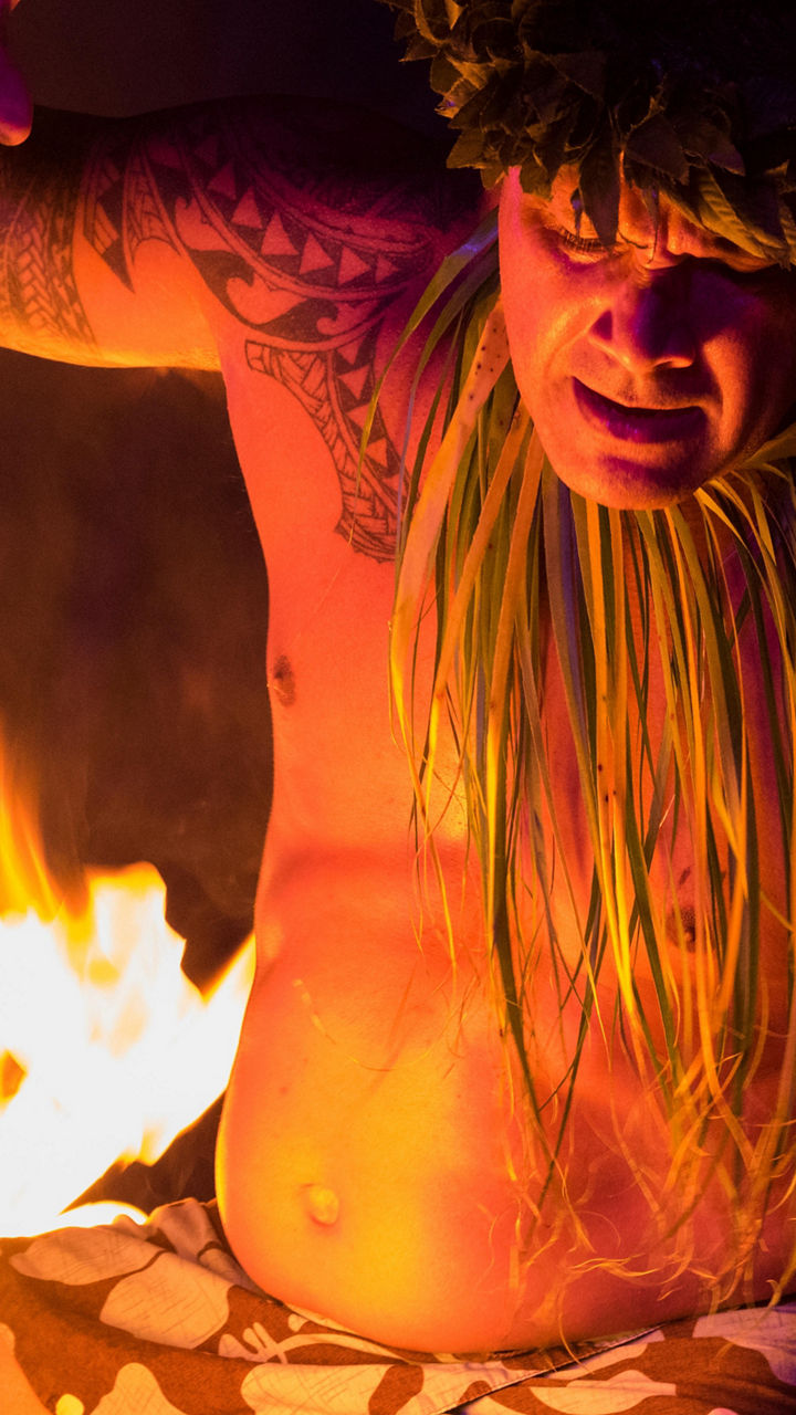 Traditional fire dance performance at night