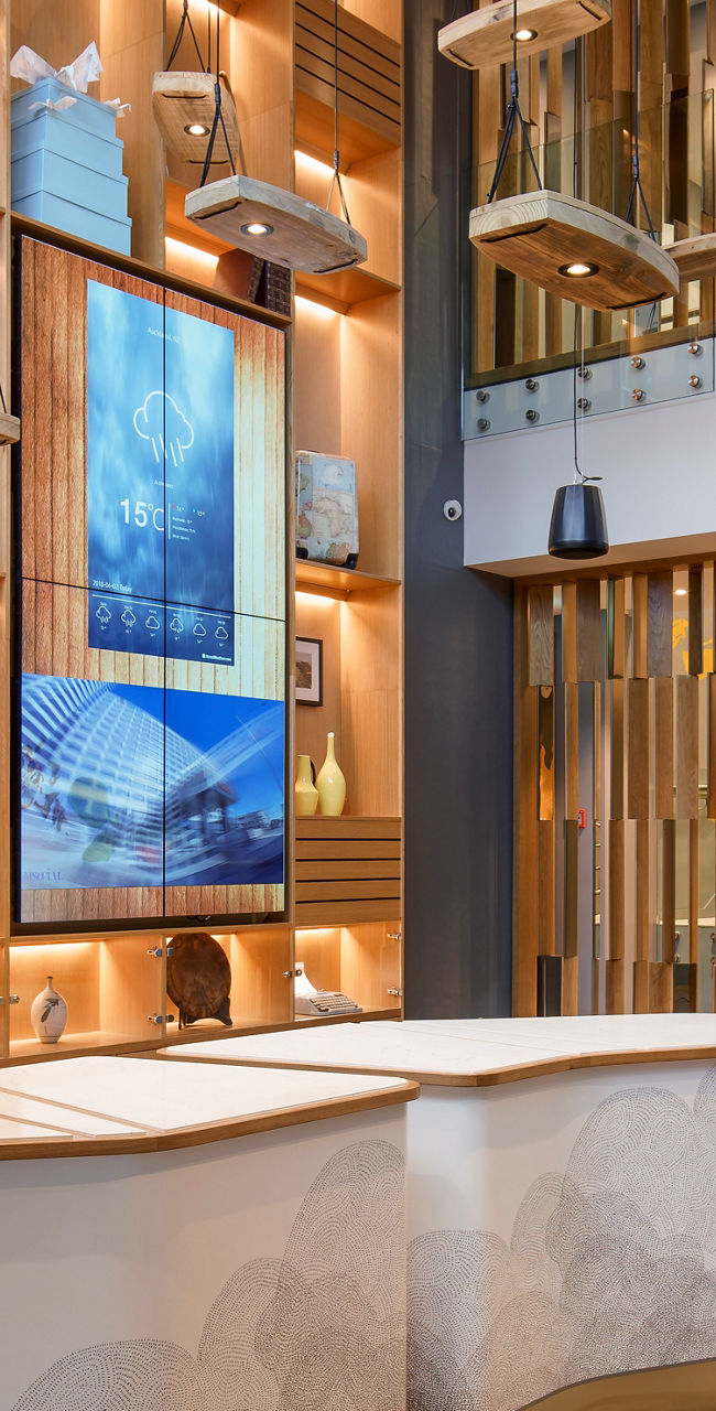 Modern hotel lobby with decorative shelving