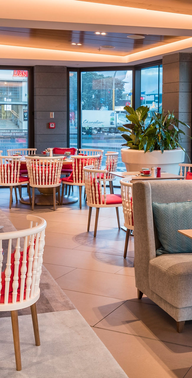 Modern restaurant interior with colorful seating