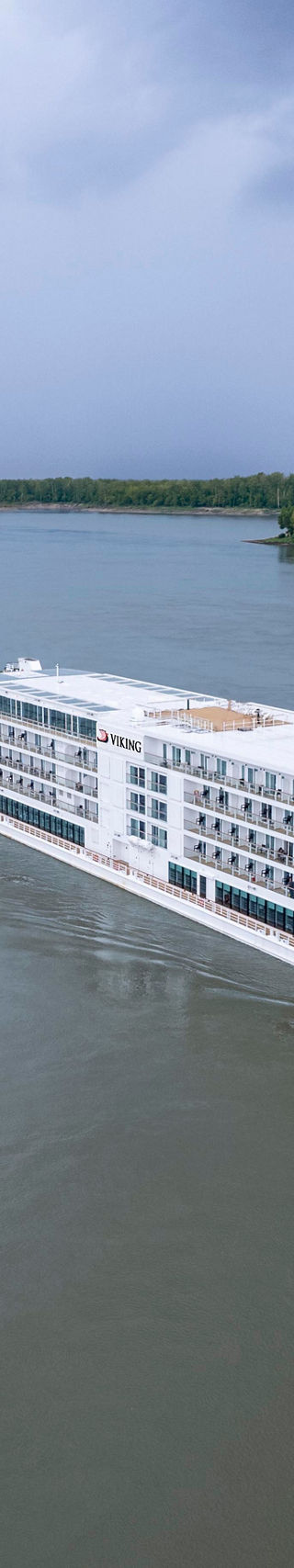Luxury river cruise ship on calm waters