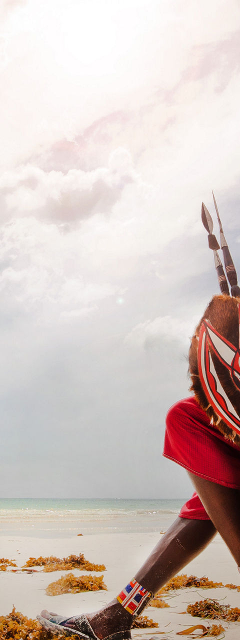 Maasai Warrior by the Ocean Shore