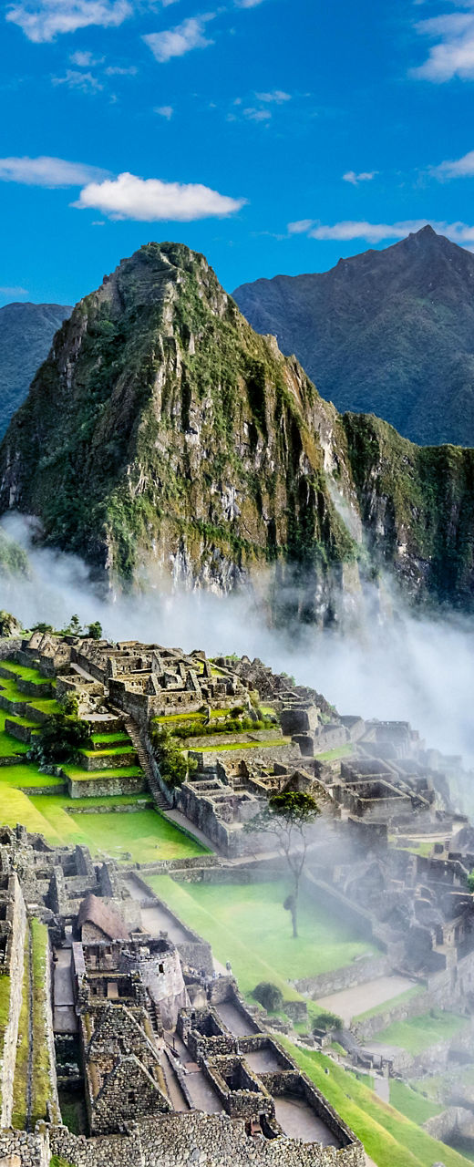 Machu Picchu ruins with mountain backdrop