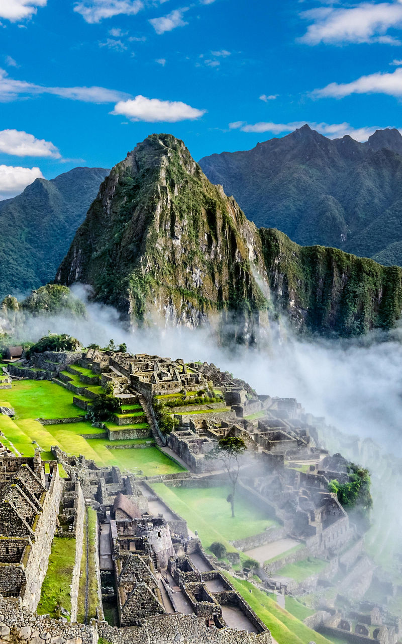 Machu Picchu ruins with mountain backdrop