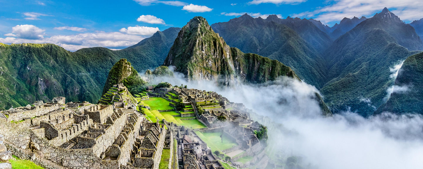 Machu Picchu ruins with mountain backdrop