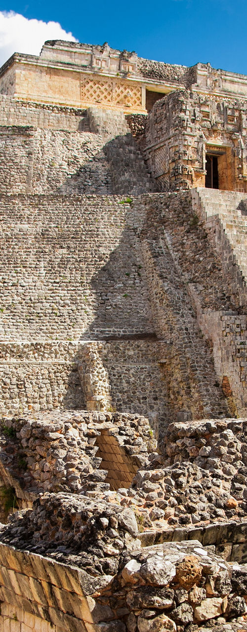 Ancient Mayan Pyramid Under Bright Blue Sky