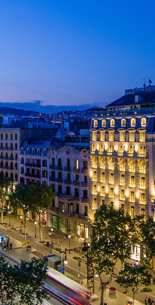 Hotel Majestic at night in cityscape view