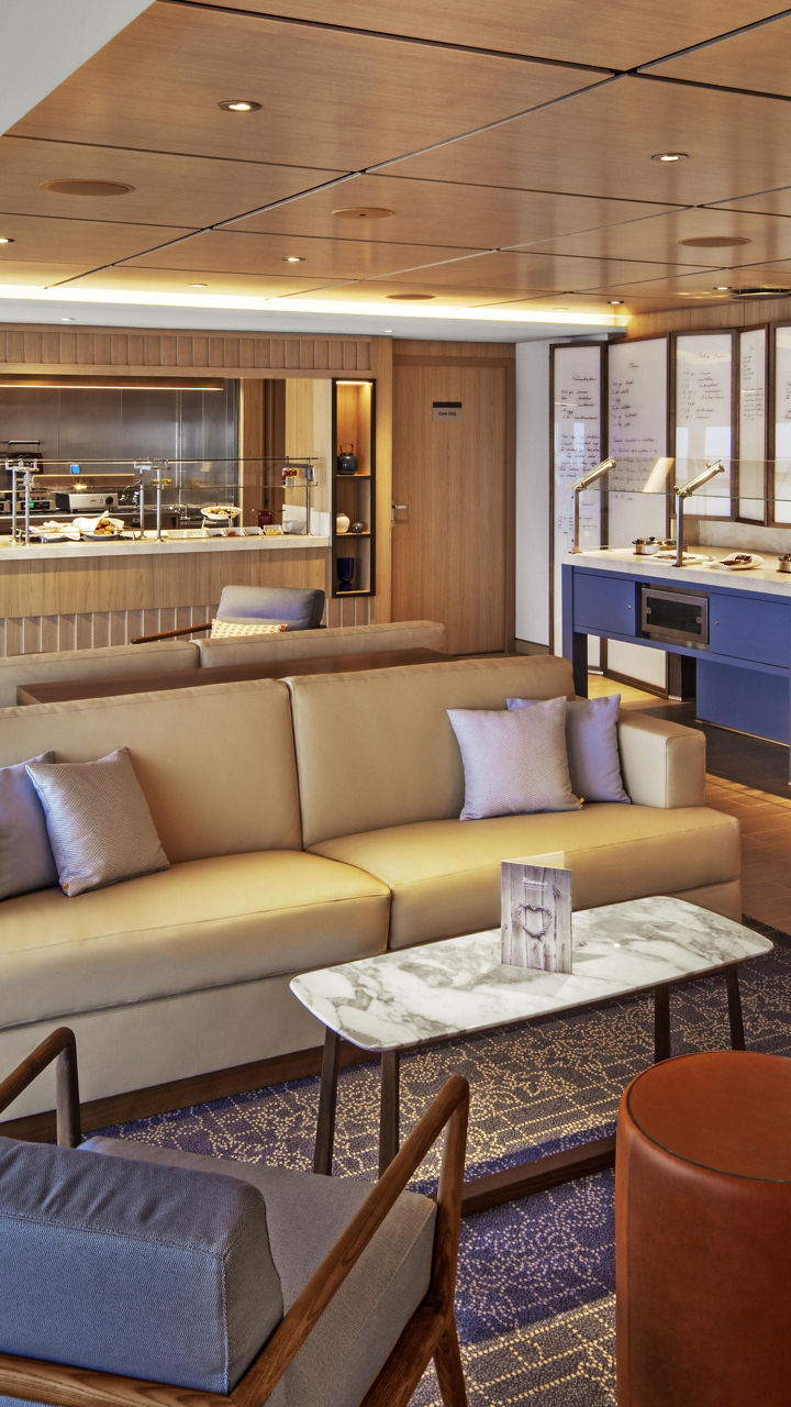 Modern lounge with buffet and seating area