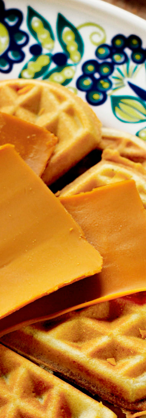 Heart-shaped waffles with cheese slices