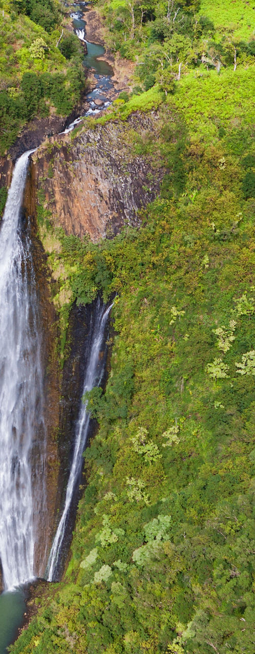 Aerial view of lush waterfall landscape