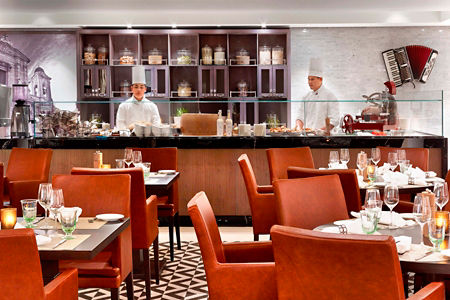 Elegant restaurant with chefs at work