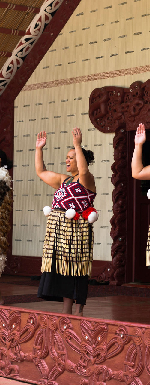Traditional Maori cultural performance in meeting house