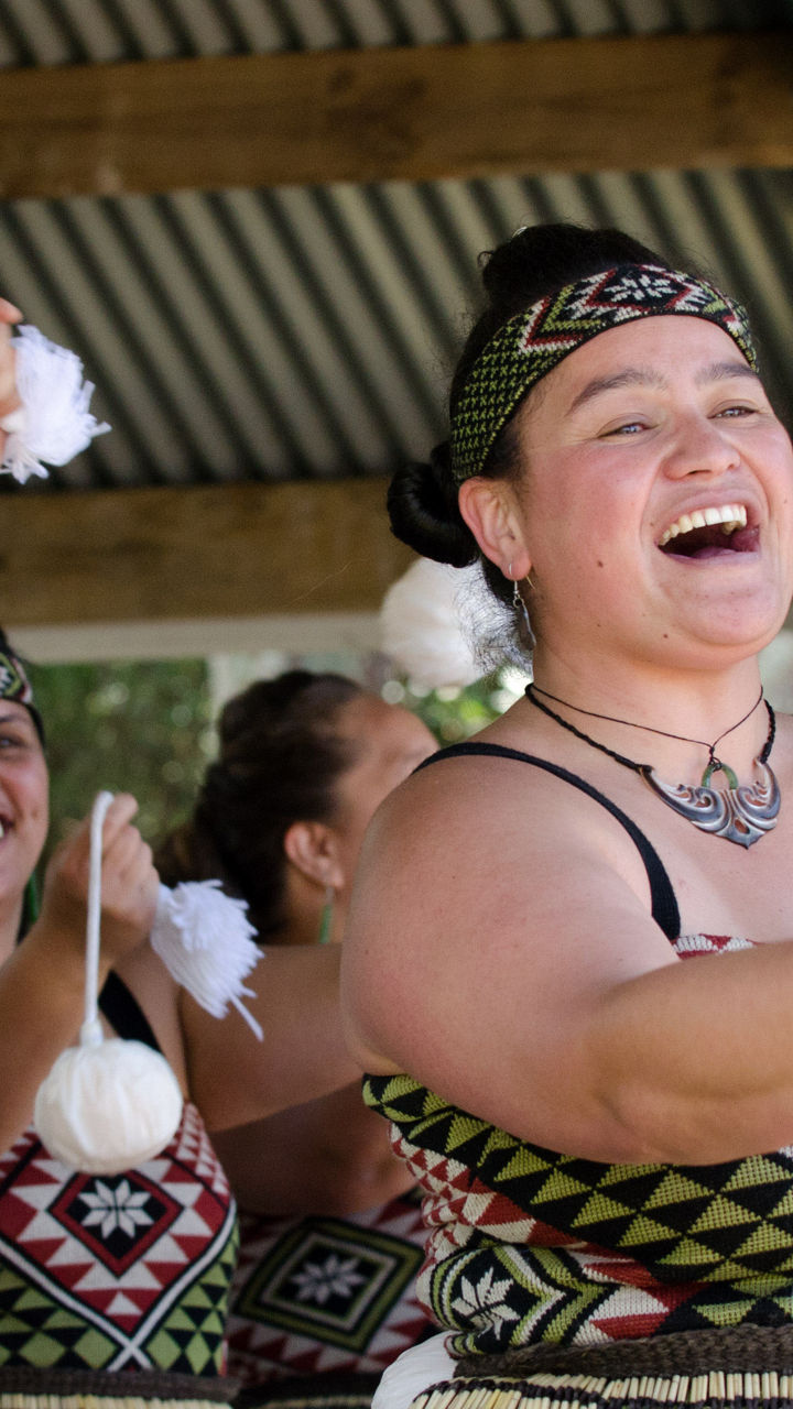Traditional Maori dance performance with poi balls