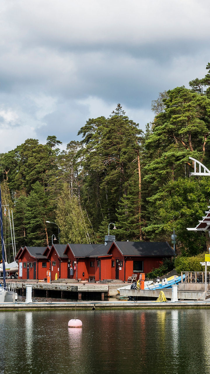 Scenic marina with boats and waterfront buildings