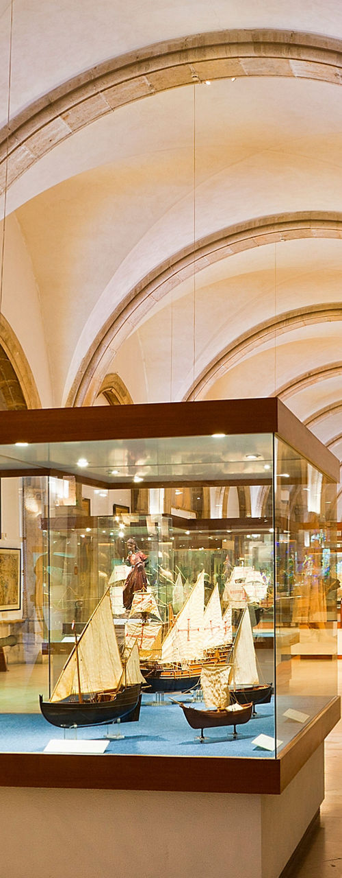 Historical museum interior with ship models
