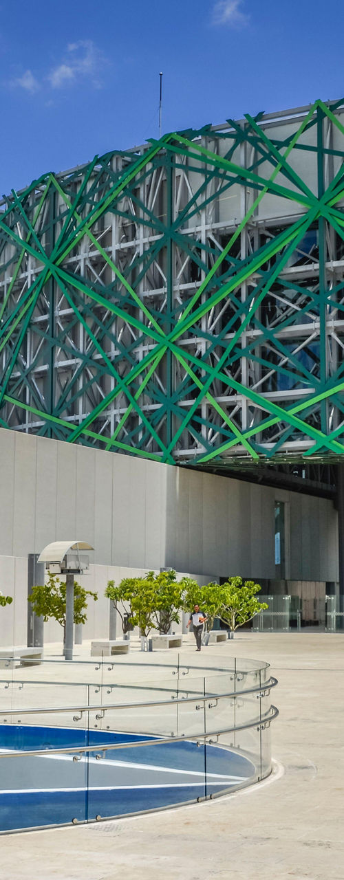 Modern museum exterior with green lattice architecture