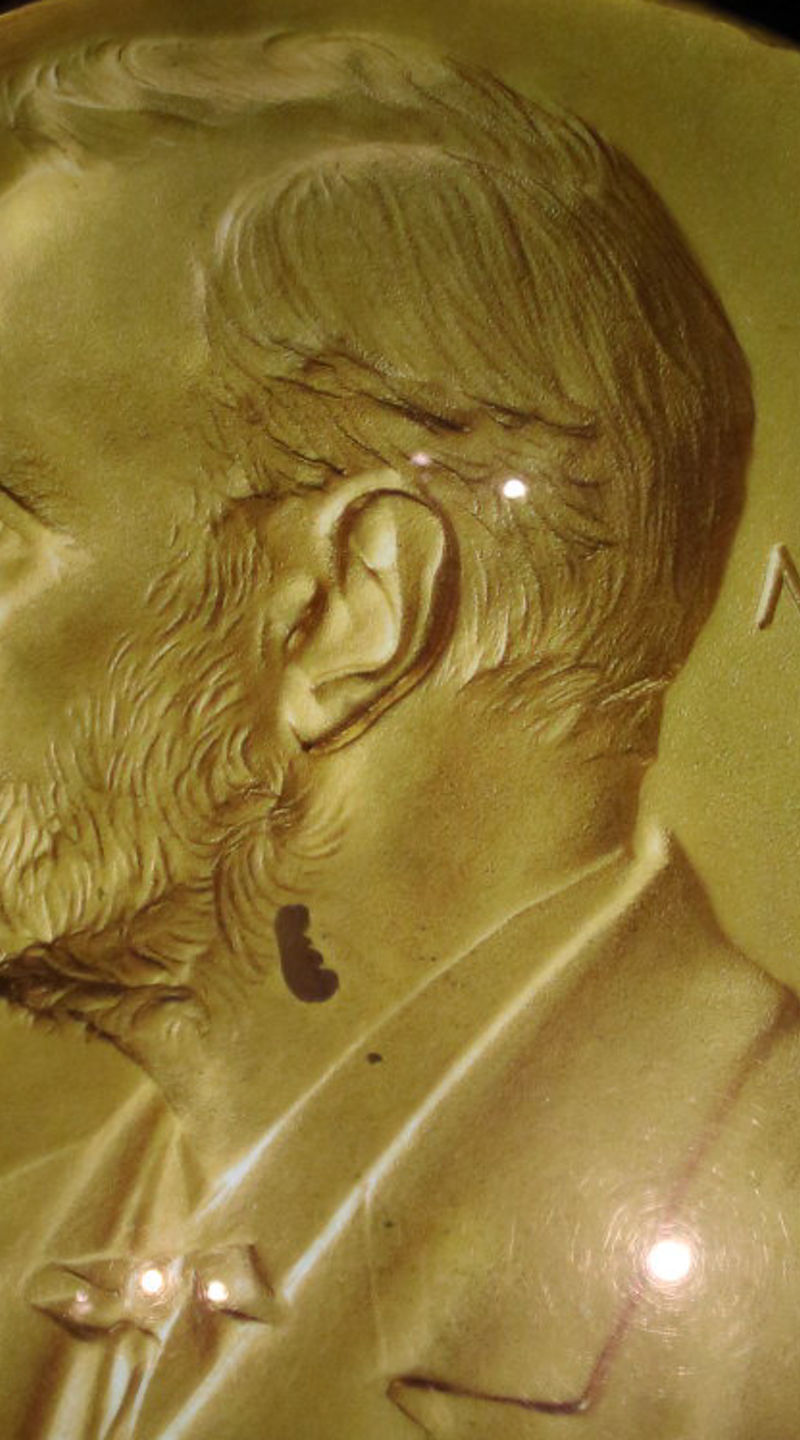 Gold Nobel Prize Medal with Engravings