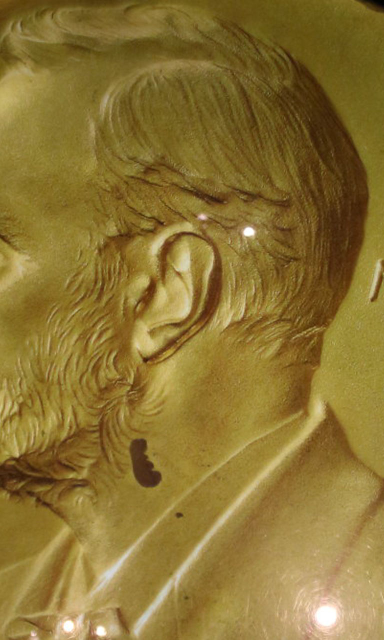 Gold Nobel Prize Medal with Engravings