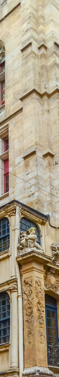 Historic clock in Rouen cityscape