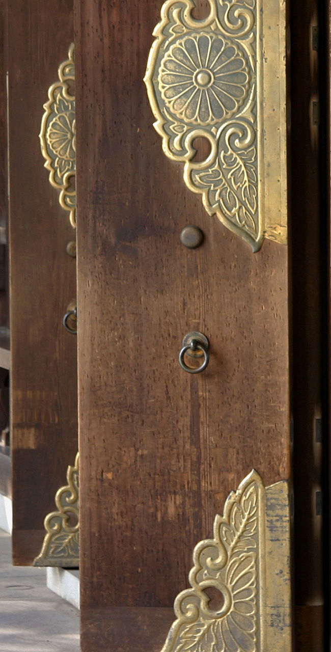 Traditional shrine with ornate wooden doors