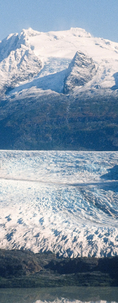 Majestic Glacier with Snowy Mountain Peaks