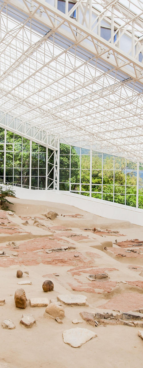 Archaeological site in modern glass structure