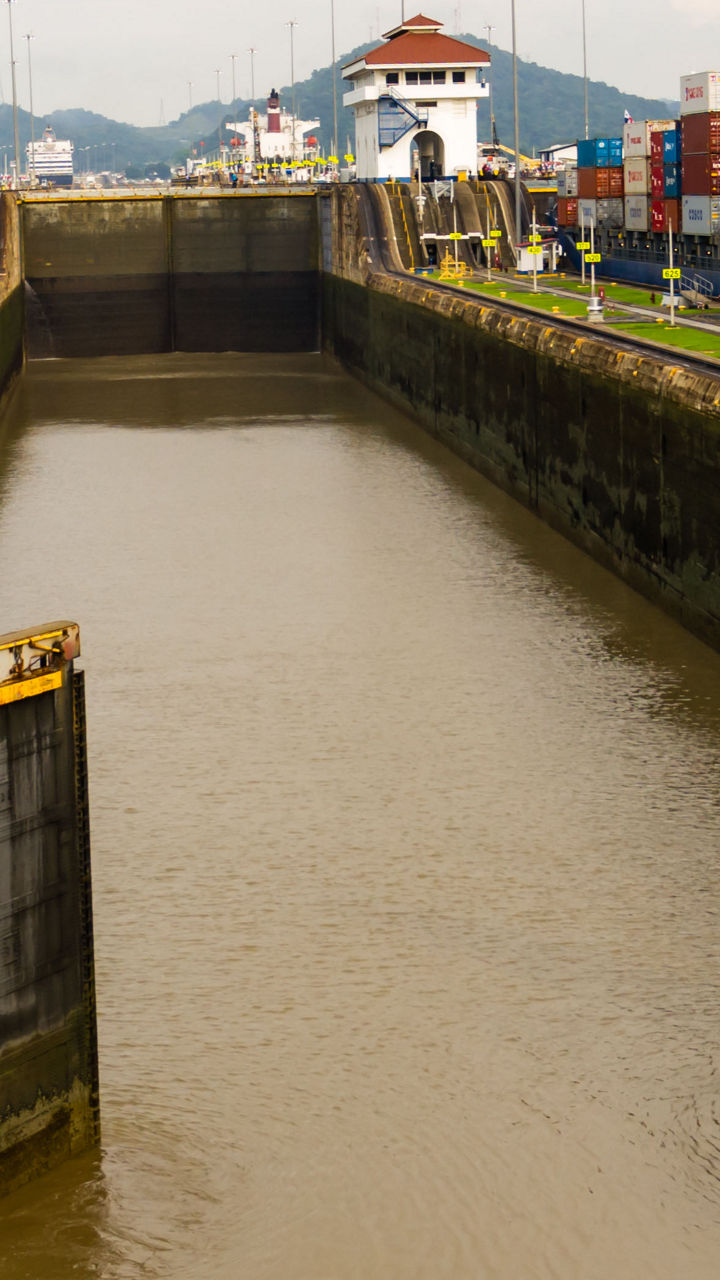 Panama Canal lock with cargo containers