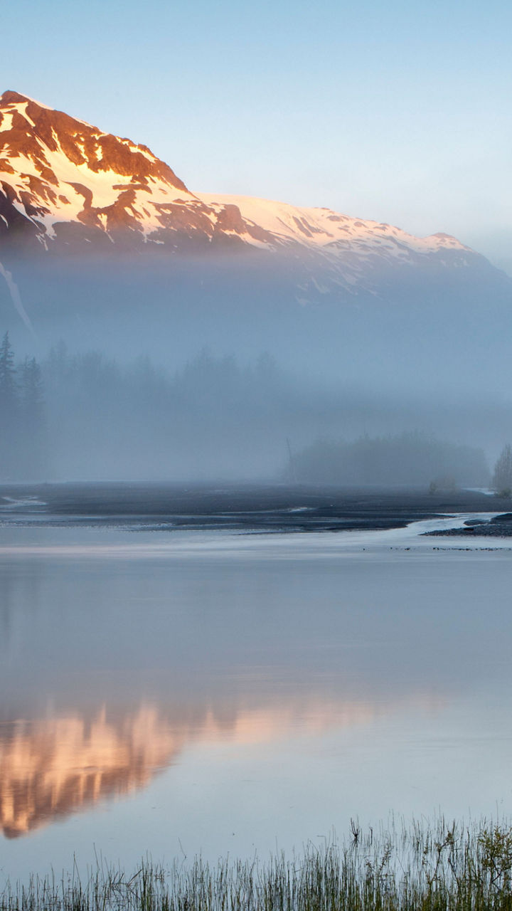 Serene mountain landscape with lake reflection
