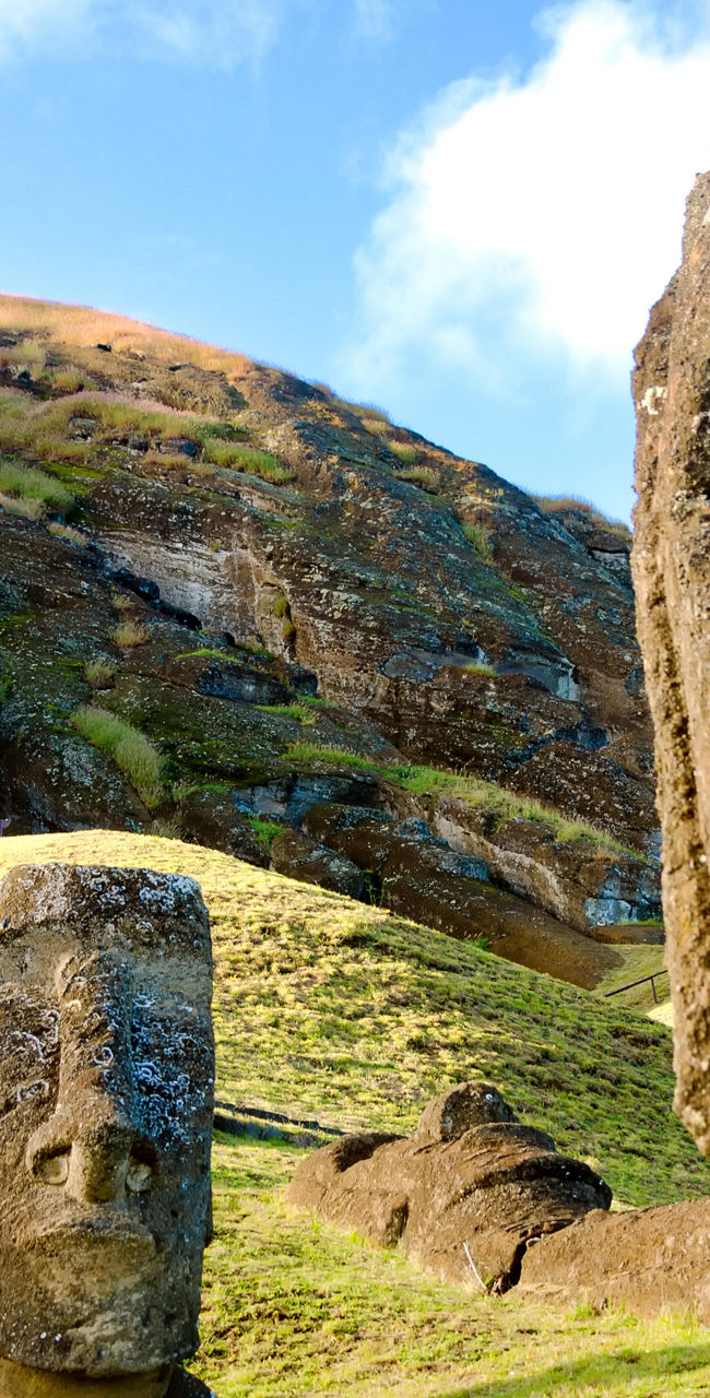 Ancient Moai statues on Easter Island hillside