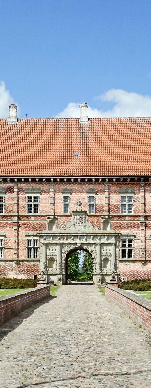 Historic red brick castle with moat