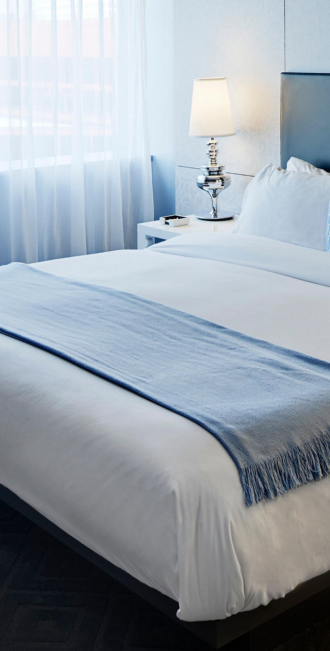 Modern hotel room with king-size bed